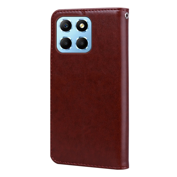 For Honor X6a Rose Embossed Flip PU Leather Phone Case(Brown)